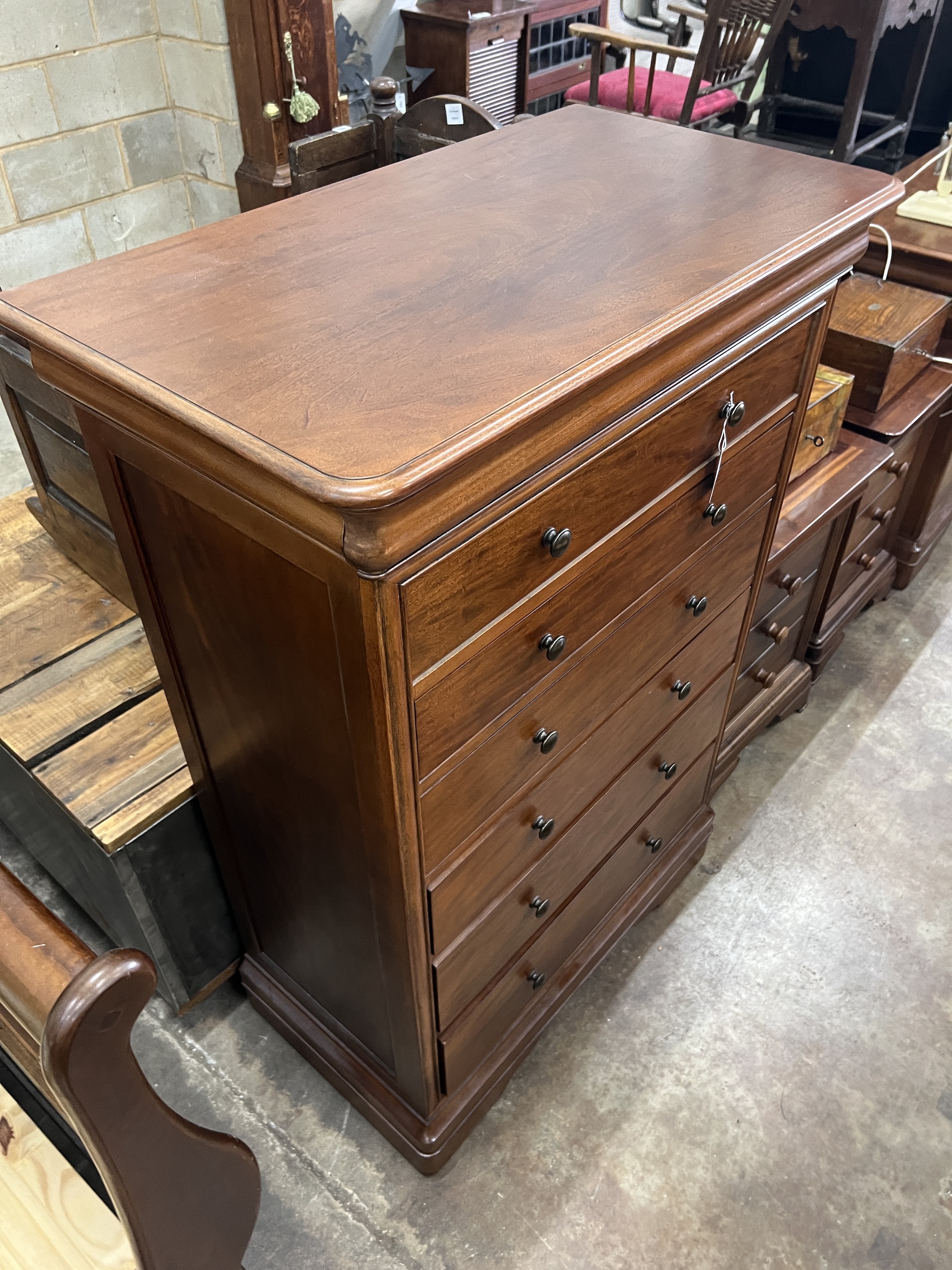 A contemporary five piece French mahogany bedroom suite, comprising sleigh bed, width 190cm, length 220cm, height 102cm (missing some bolts), a six drawer tall chest, three drawer chest and a pair of bedside chests